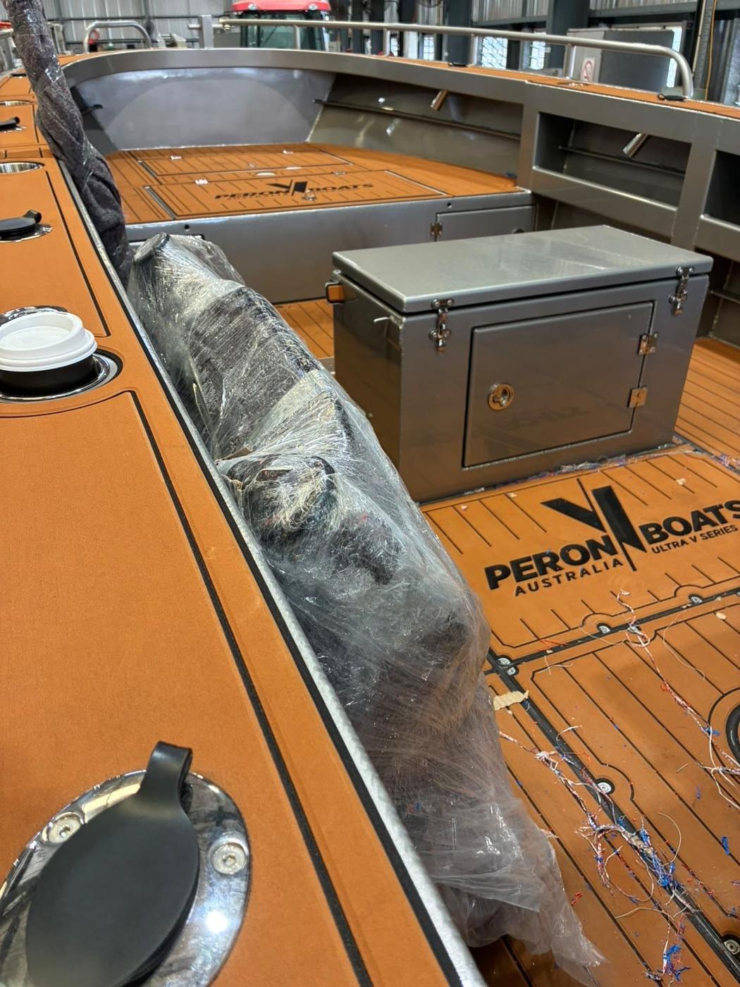 EVA flooring with the Peron Boats logo